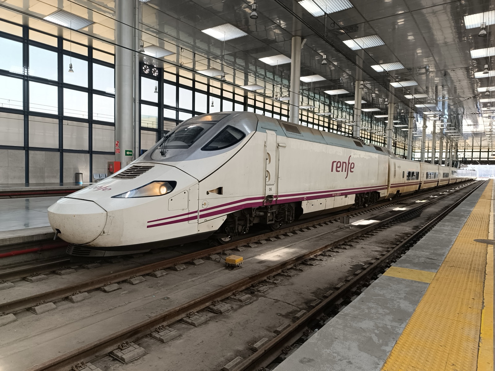 Modern Renfe commuter train at a station platform in Spain