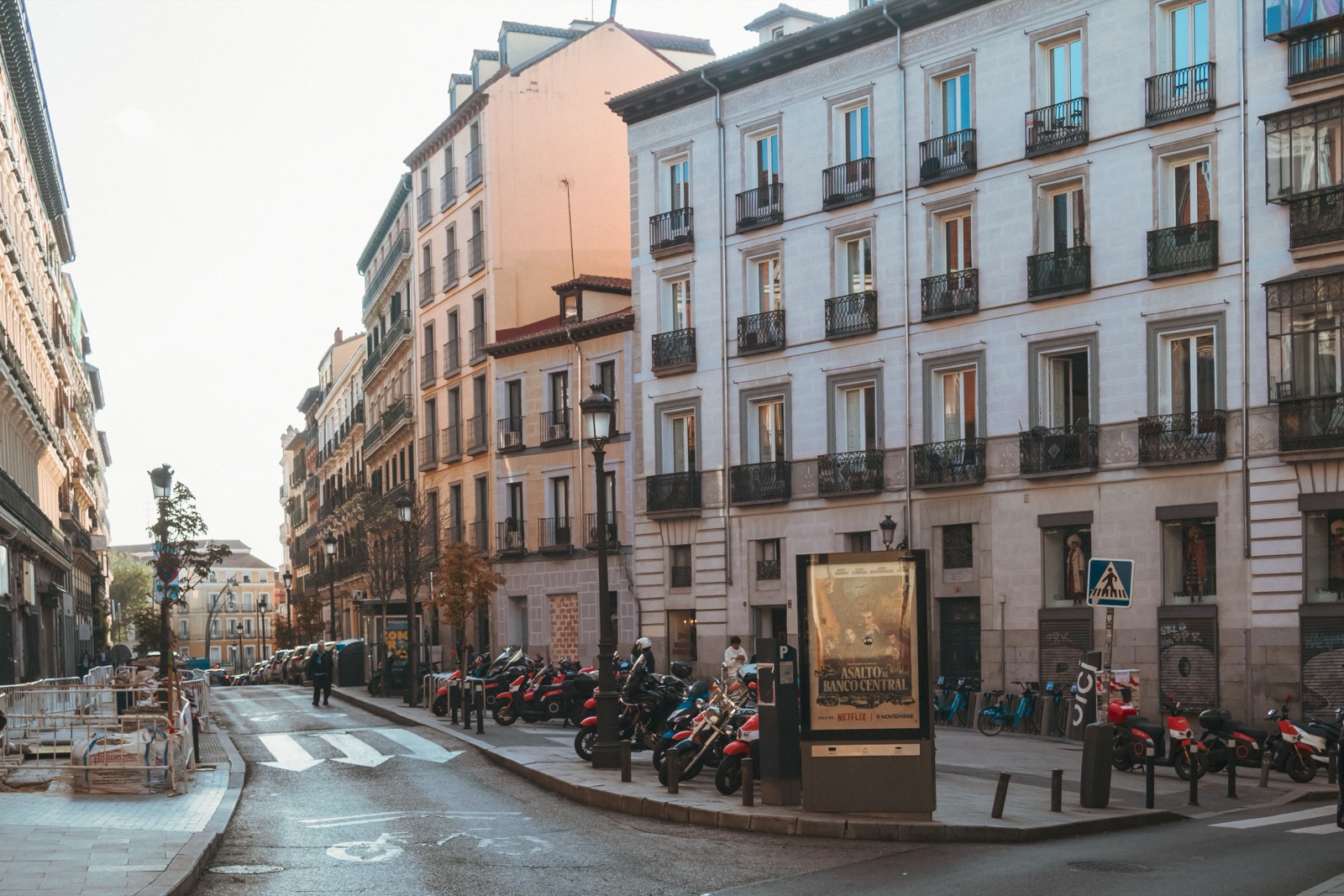 Quiet residential street lined with classic architecture in a Madrid neighborhood
