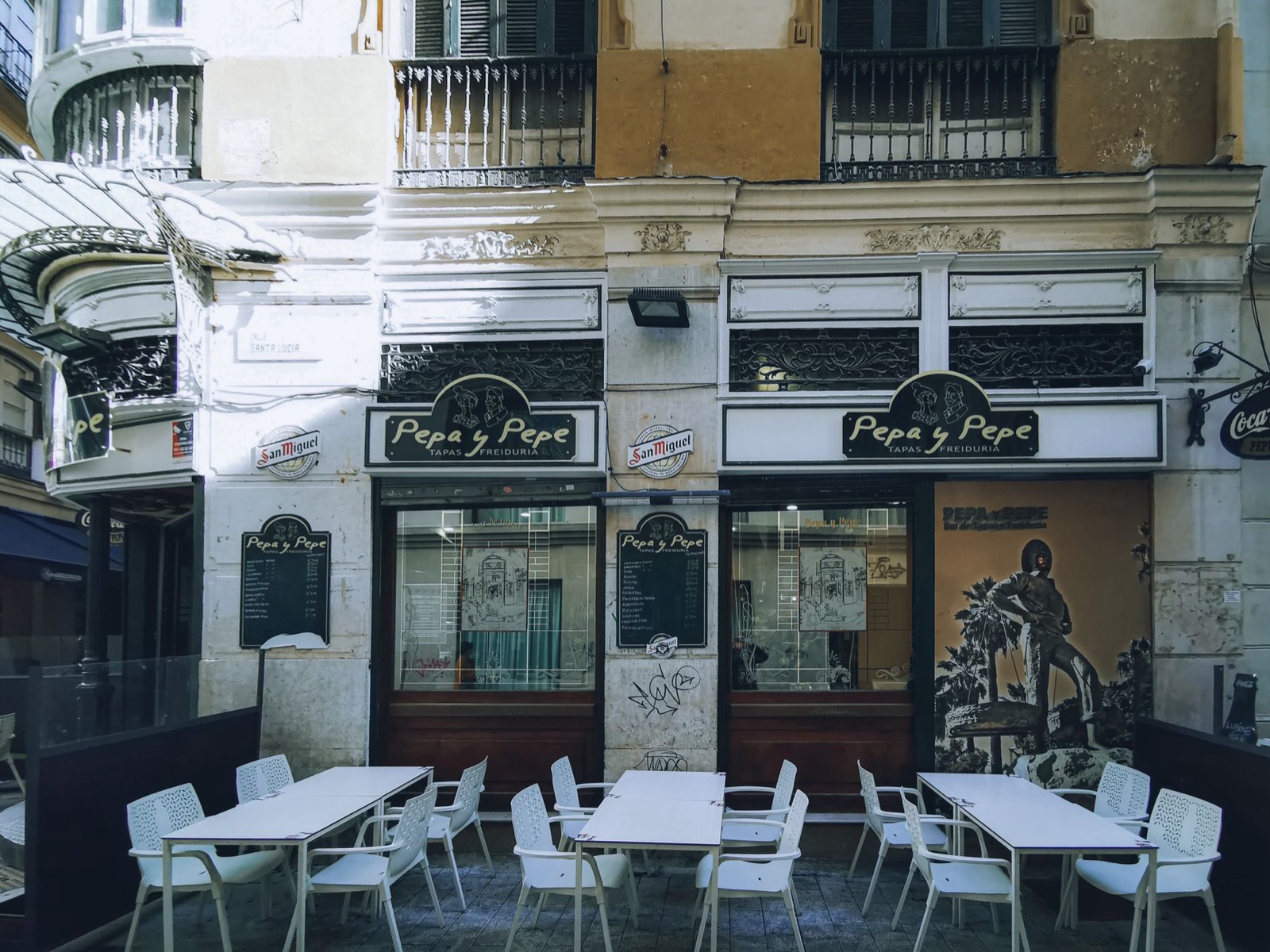 Outdoor seating at a Seville restaurant terrace