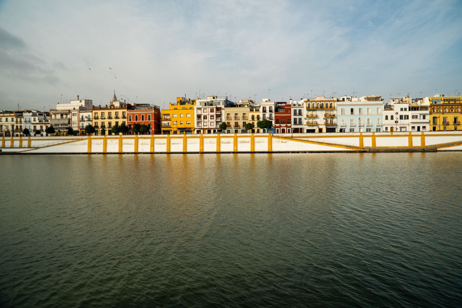 Colorful waterfront houses in Triana, Seville
