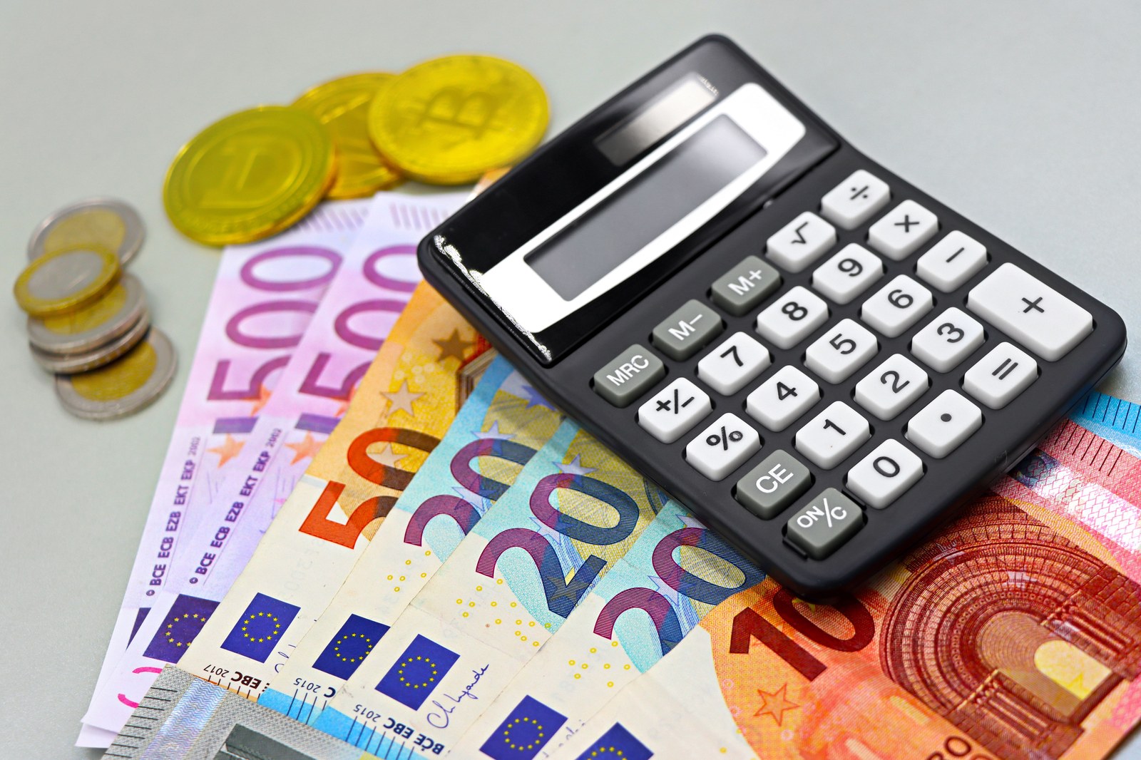 Calculator on top of euro banknotes