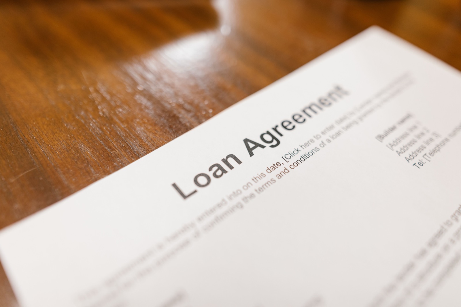 Loan agreement document on a desk