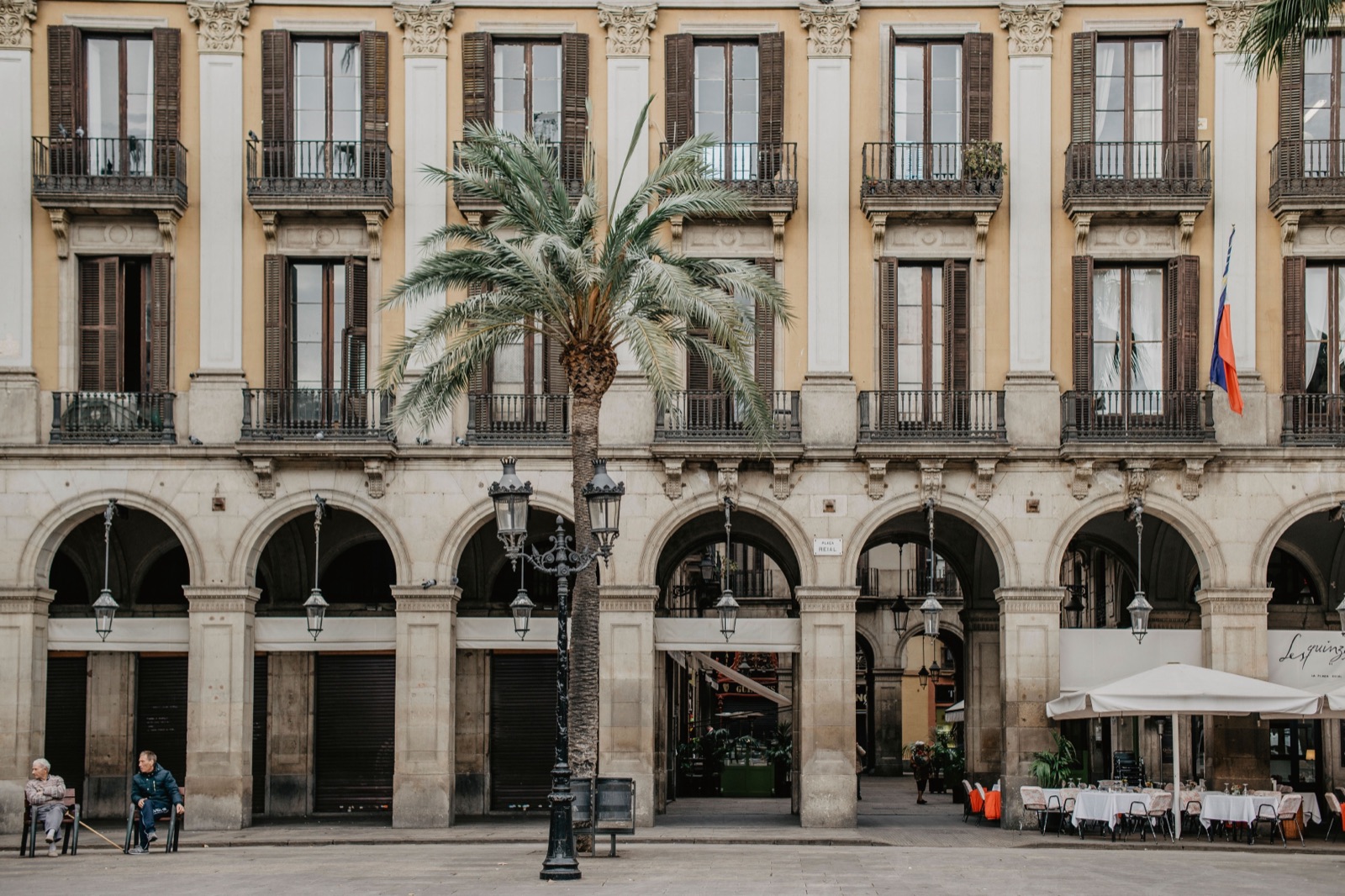 Plaça Reial, a busy arcaded plaza in Barcelona
